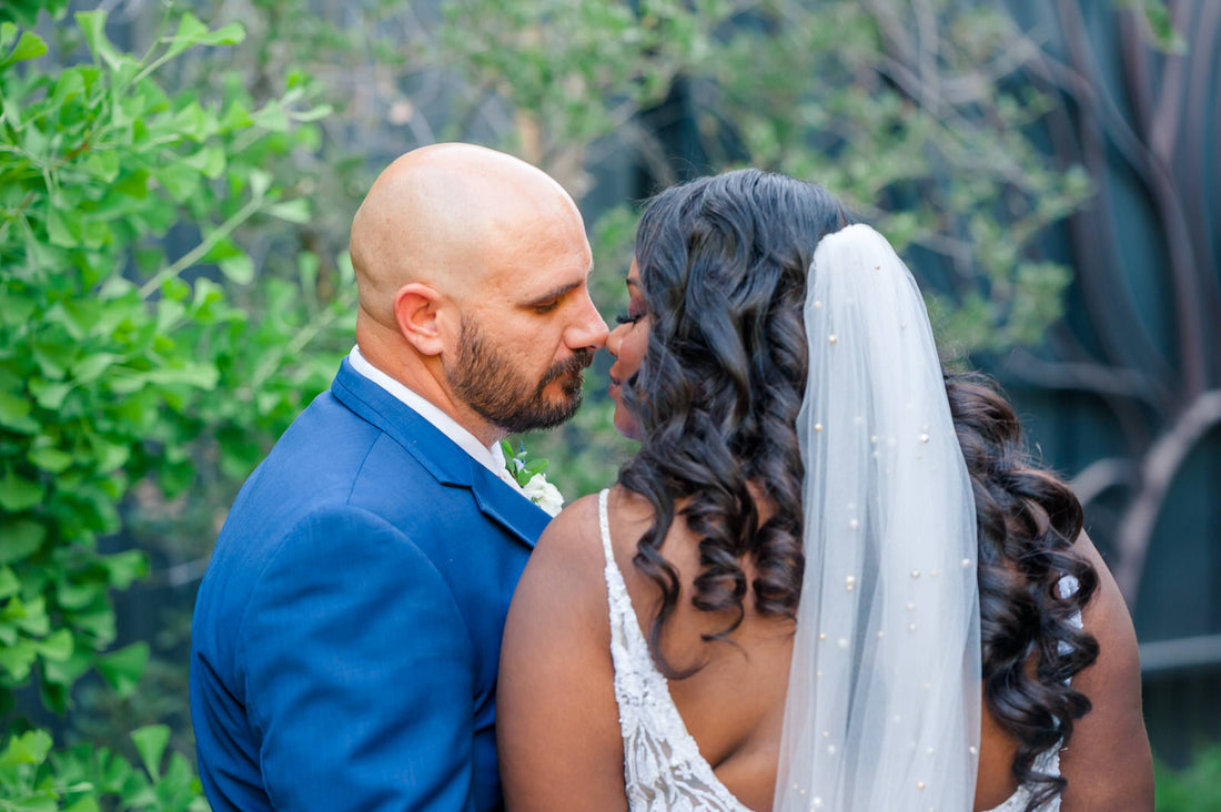 pearl studded long wedding veil in curly downdo
