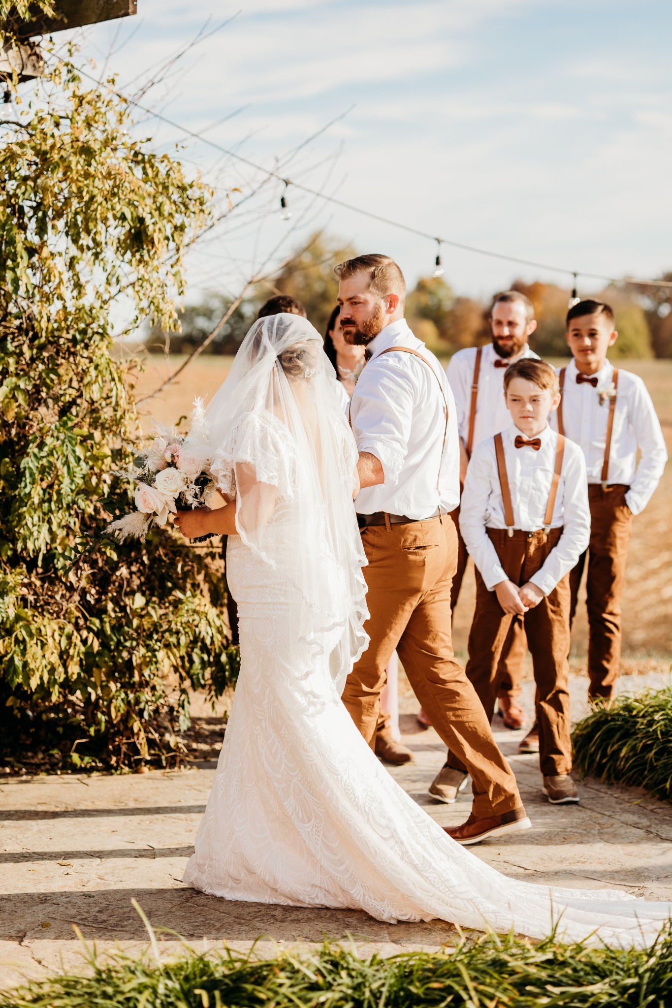 barn house wedding inspiration with bride in Juliet cap bridal veil in ivory tulle with lace trim