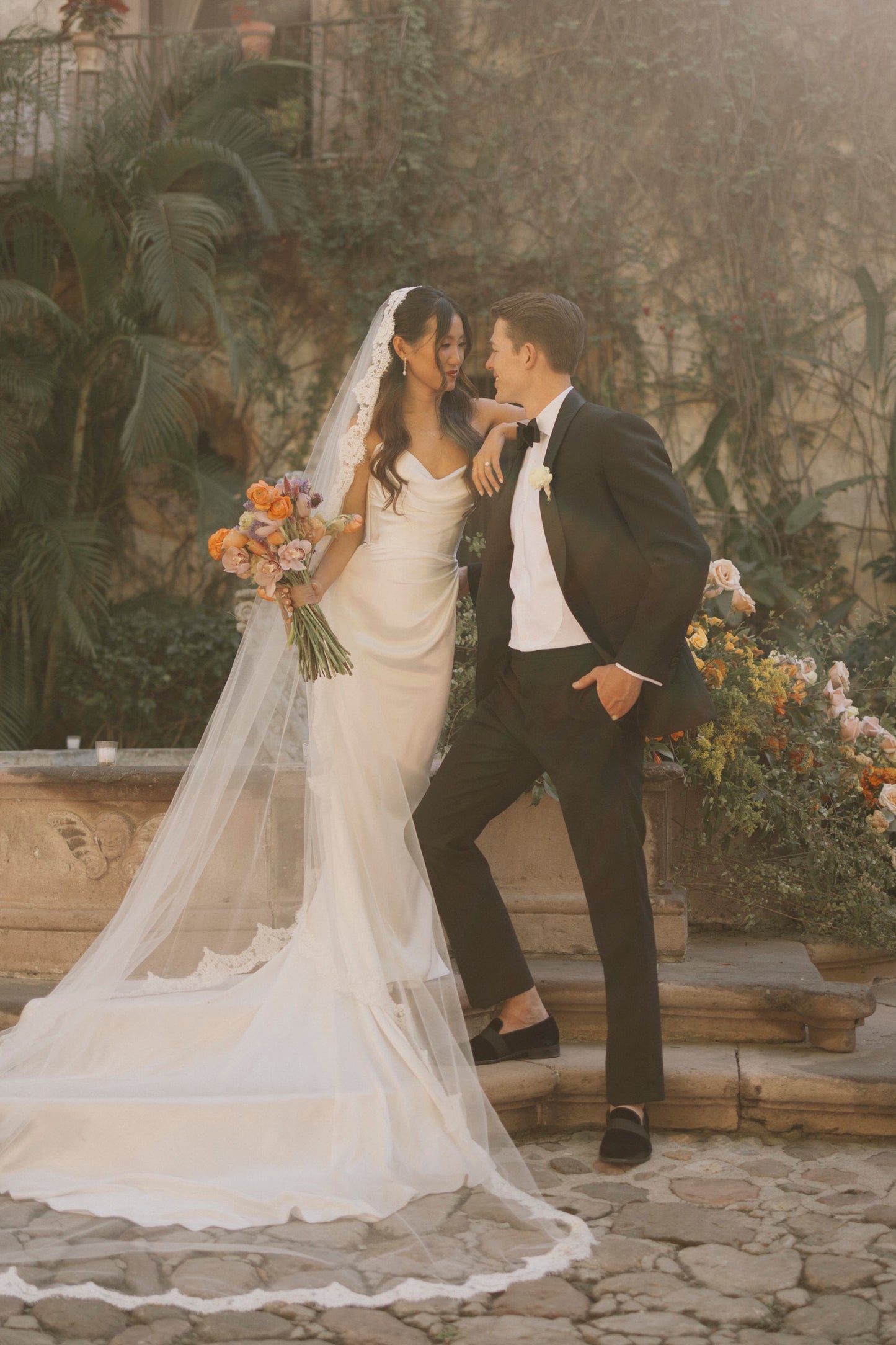 Spanish style mantilla wedding veil cathedral length with draped corset gown