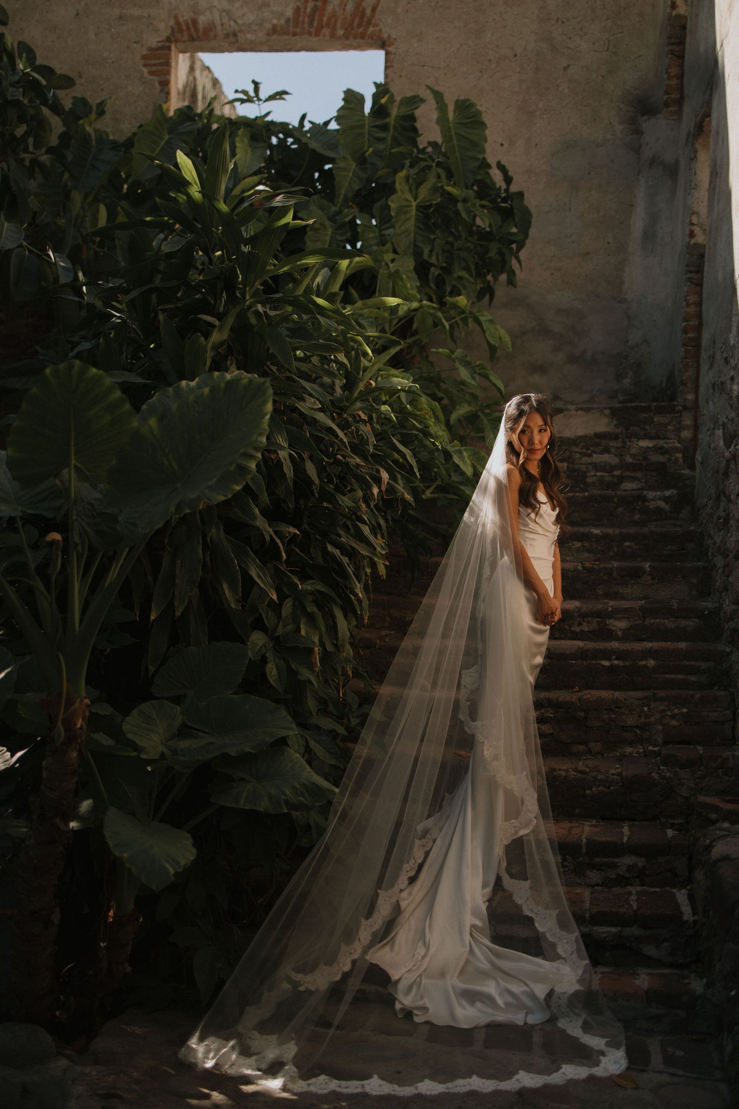 moody bridal portrait with long mantilla wedding veil from one blushing bride