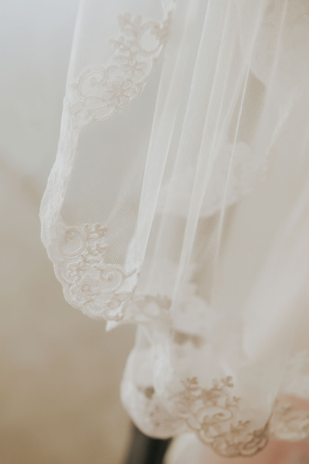 delicate swirl French alencon lace trim bridal veil in ivory mid length