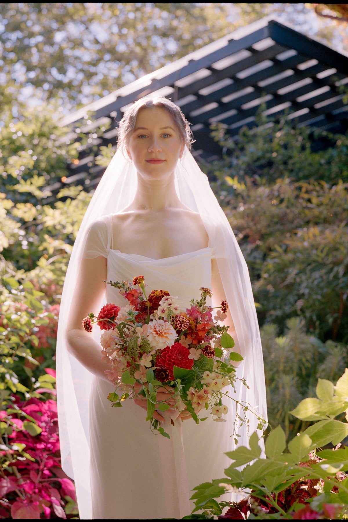 silk soft mid length veil in garden setting