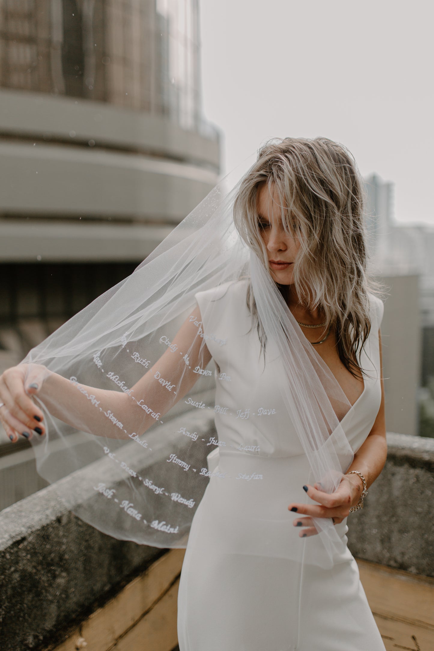 casual deep V neck wedding jumpsuit and heirloom embroidered wedding veil with custom text and writing