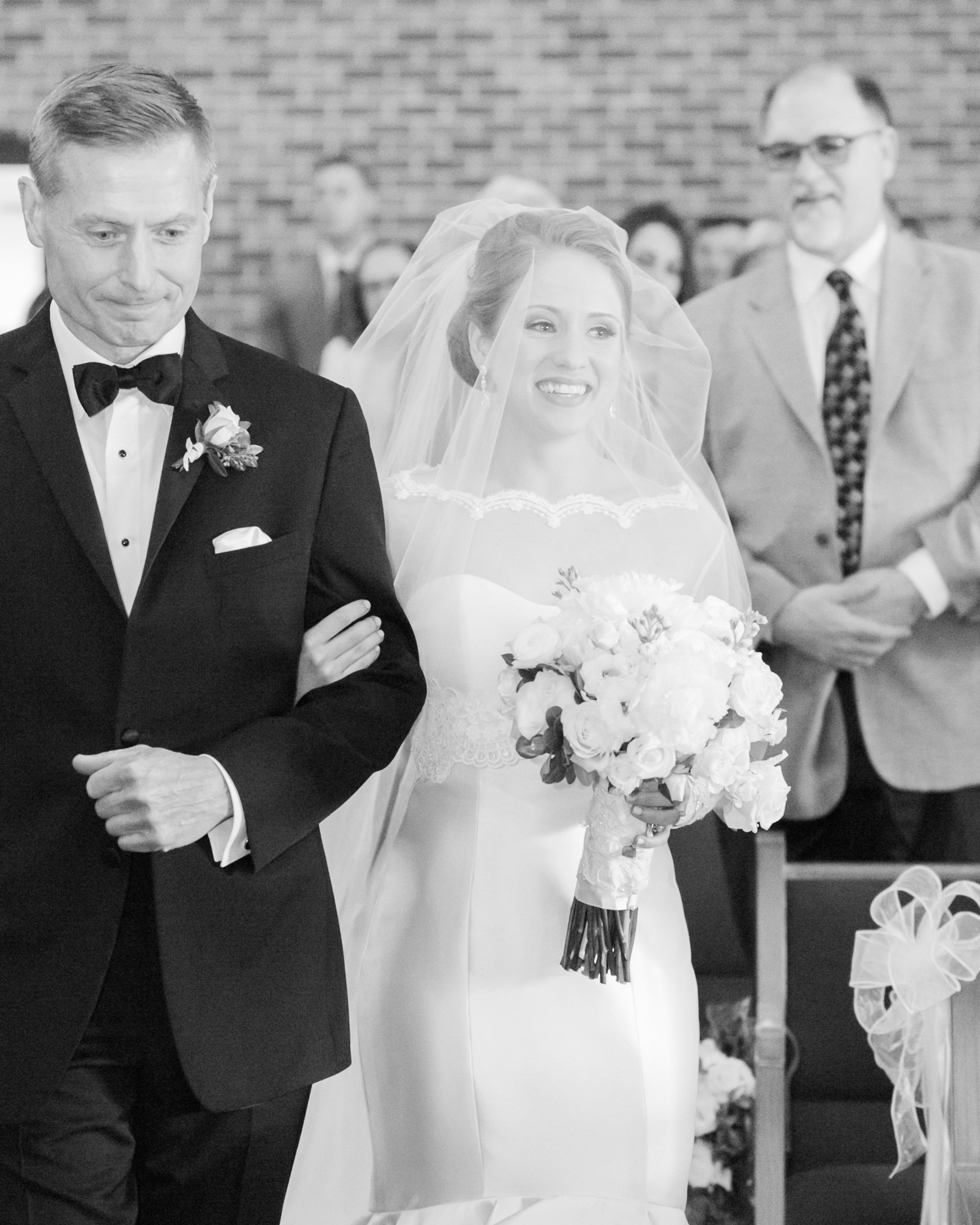 classic blusher wedding veil on bride walking down aisle with Dad