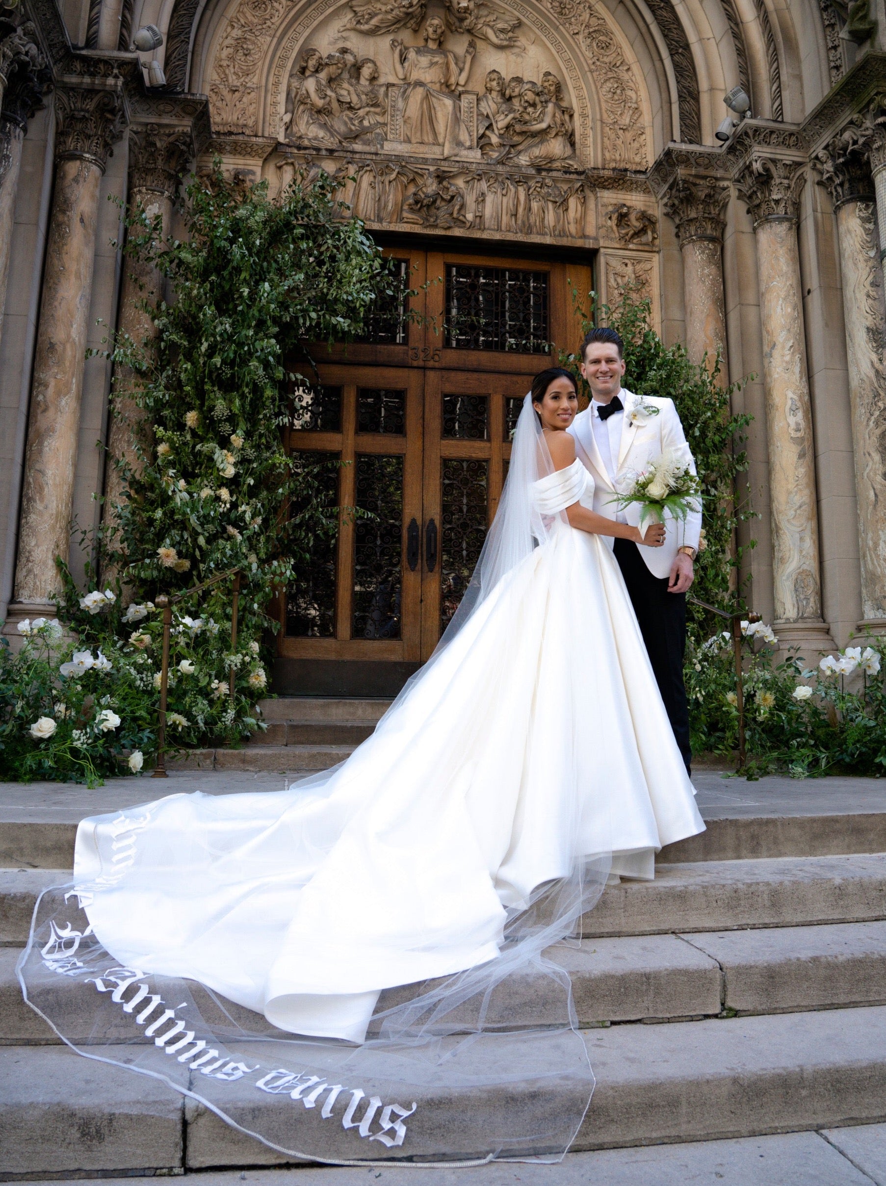 off the shoulder wedding gown with royal length wedding veil  with gothic embroidered phrase