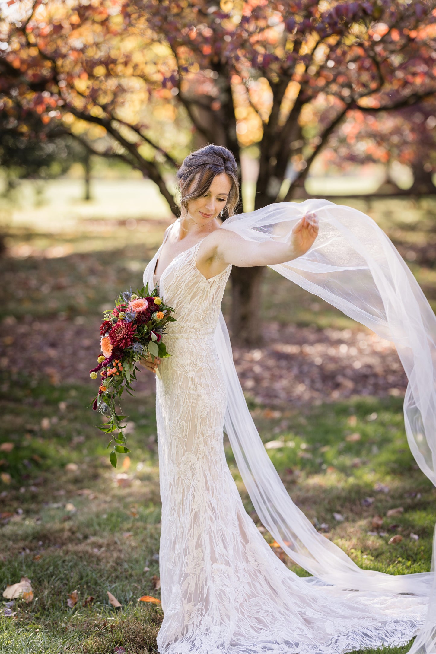 flowy light ivory tulle wedding wings with lace embroidered bridal gown