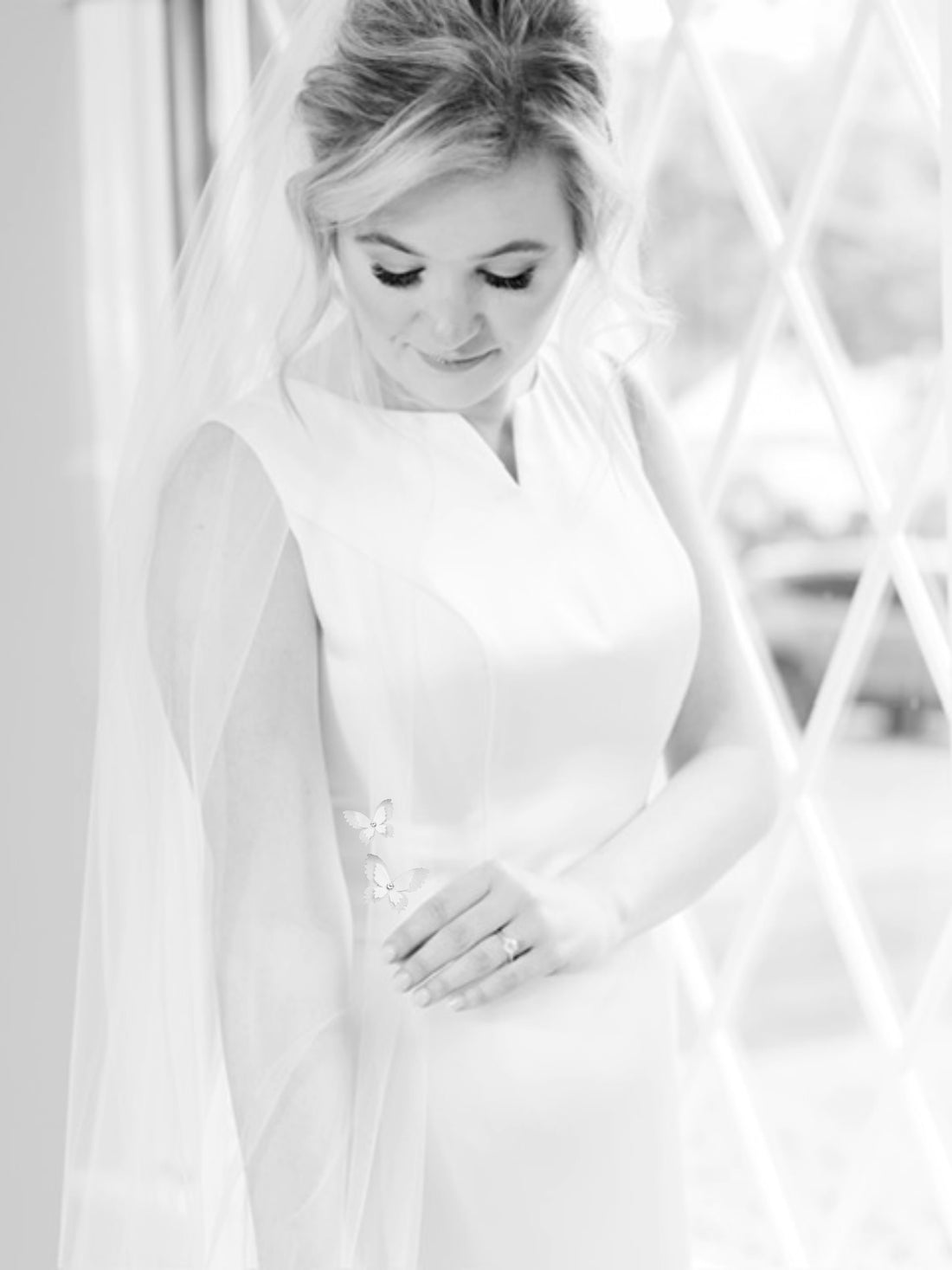 duo of butterflies on long simple wedding veil with mikado wedding dress