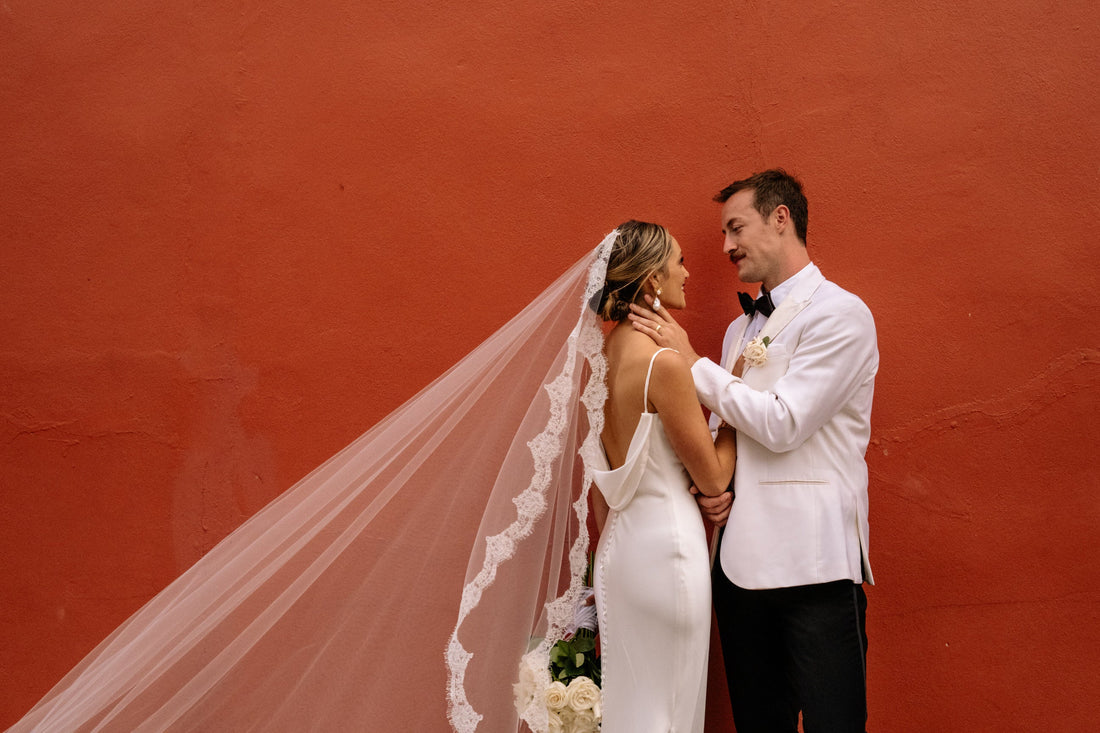 veil for backless dress Cowl back Archie wedding dress from Made with Love Bridal with long wedding veil + white bouquet