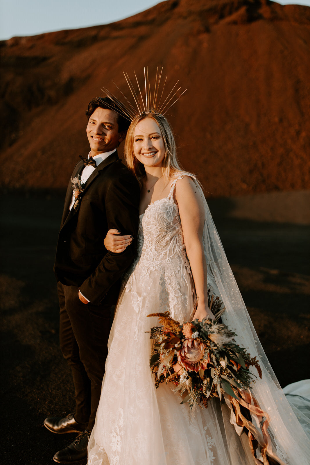 galaxy magic harry inspired wedding elopement with bride wearing gold star draped wedding cape and spiky goddess crown