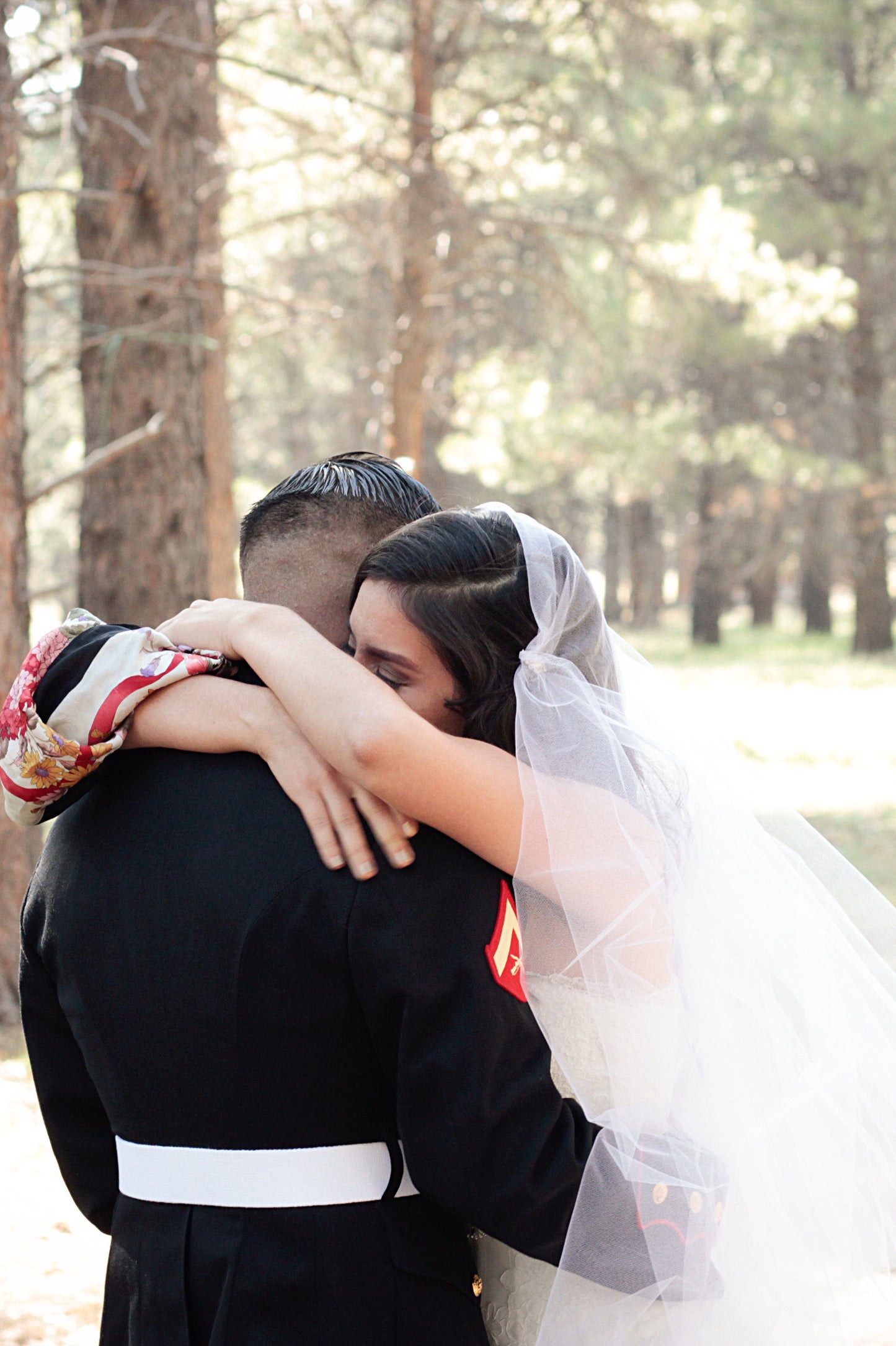 military wedding with bride wearing two layer Juliet cap bridal veil with rhinestone brooches