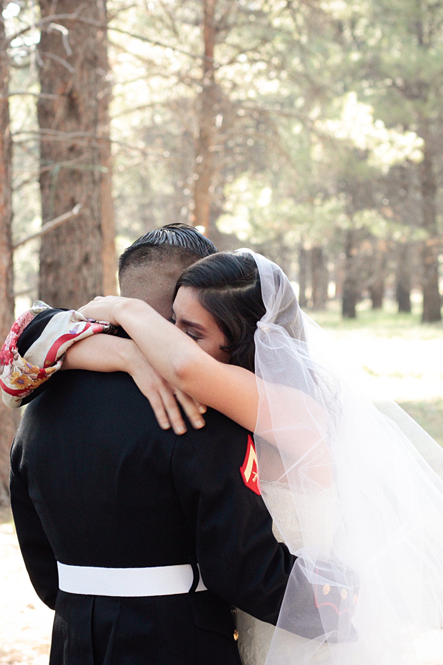 military wedding with bride wearing two layer Juliet cap bridal veil with rhinestone brooches