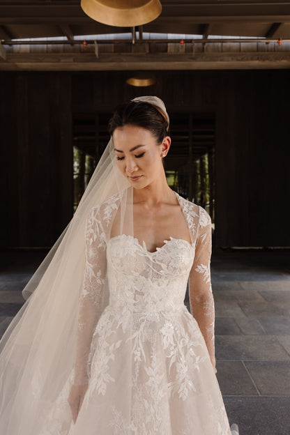 blush nude drop wedding veil over high updo