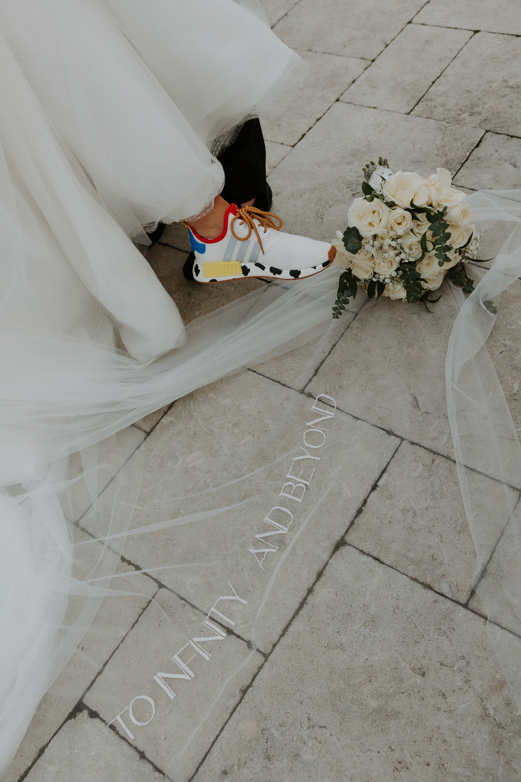 simple all caps embroidered wedding veil for Toy Story wedding