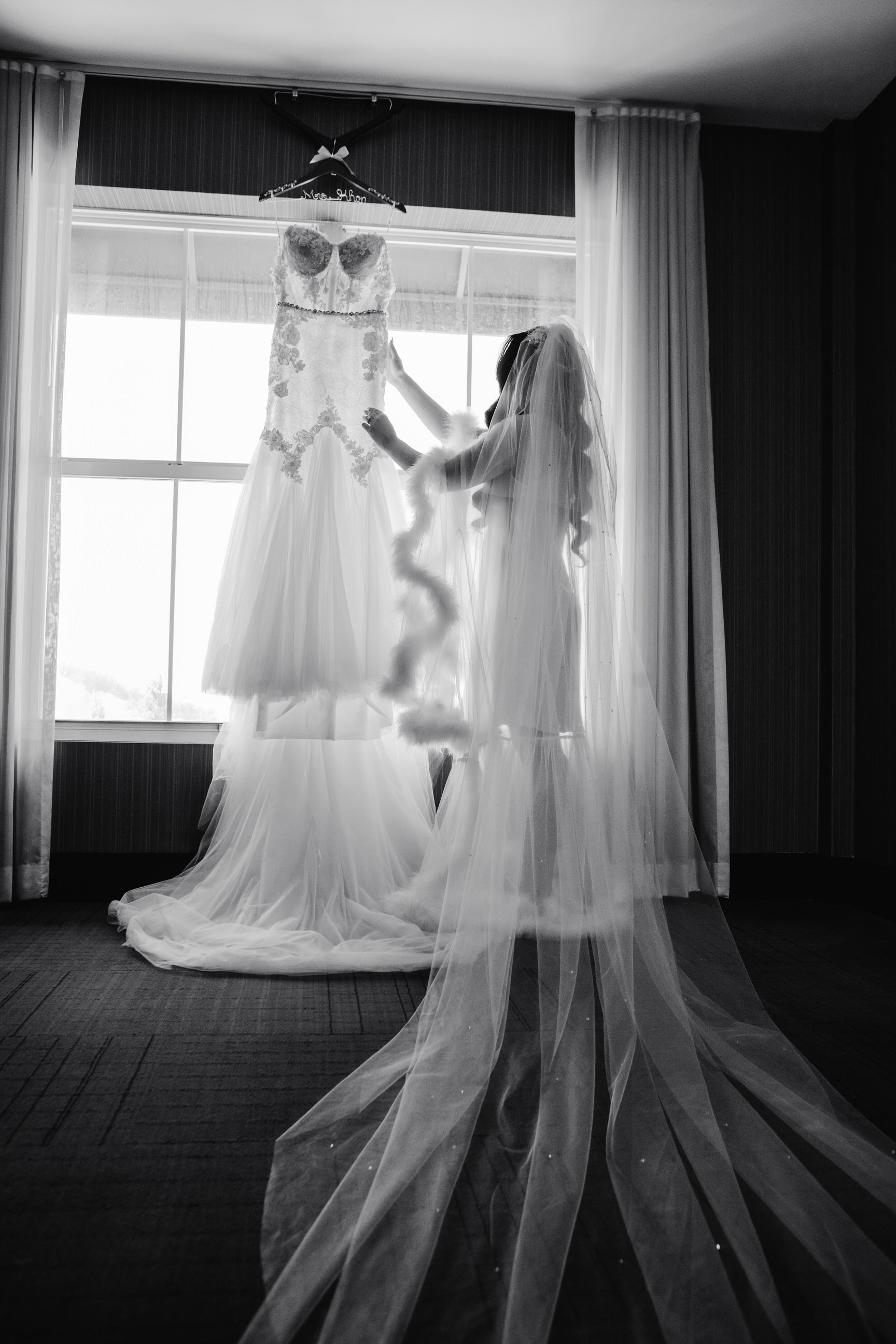 bridge in ruffle feather robe with long scattered rhinestones sparkly wedding veil