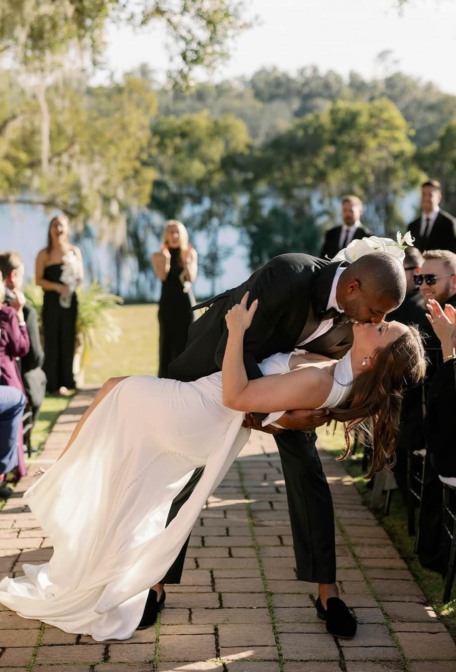 post wedding kiss with silk satin long bridal scarf on neck
