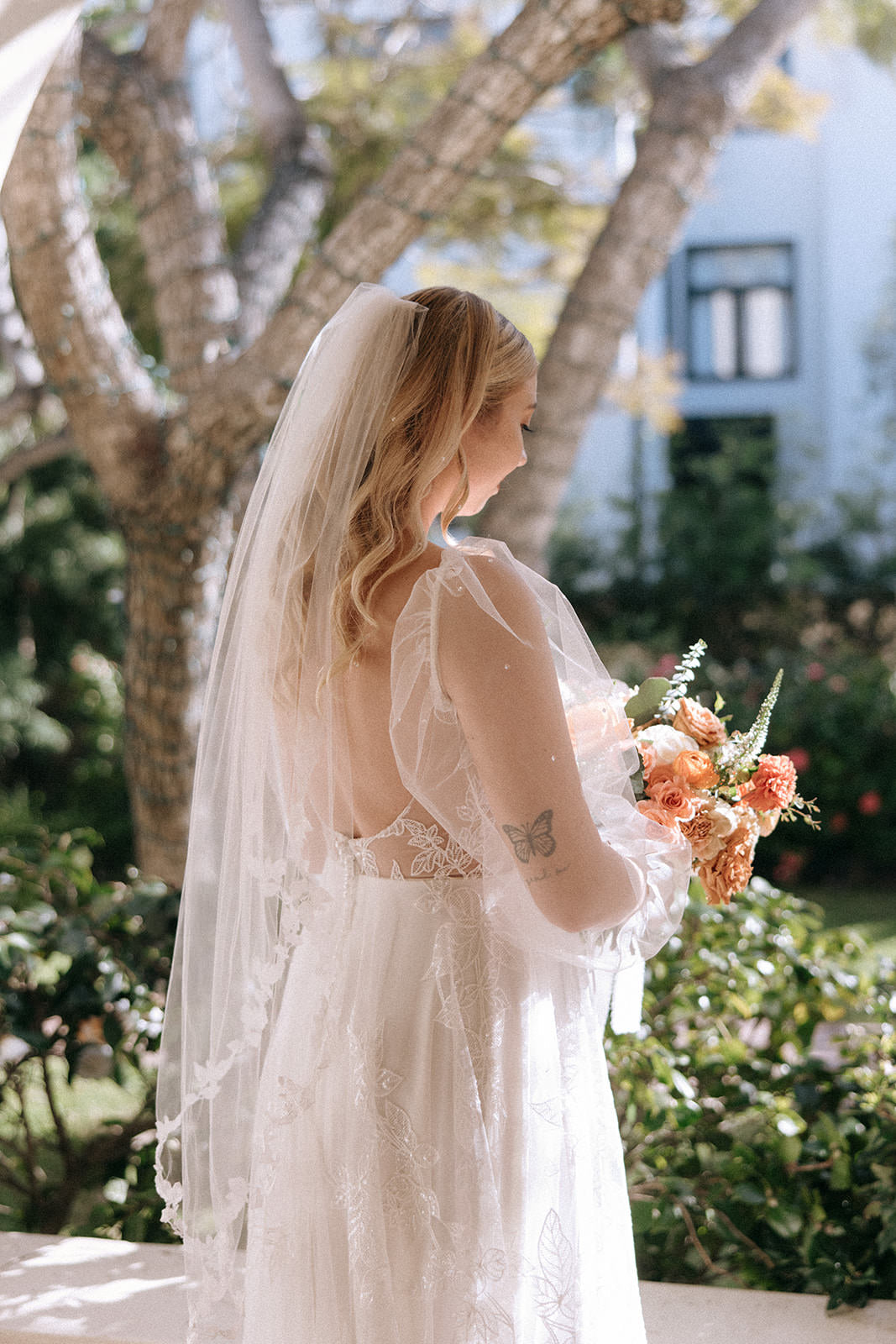 romantic vine and leaf wedding veil on bride with puff sleeve tulle bridal dress