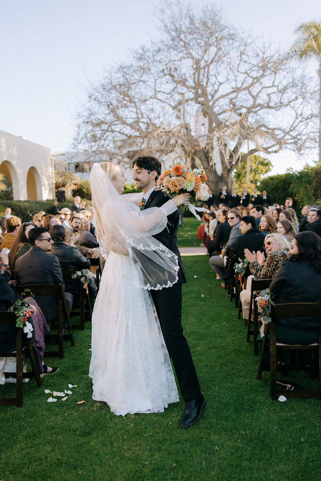 Southern California wedding with fingertip wedding veil with romantic leaves and branch embroidery
