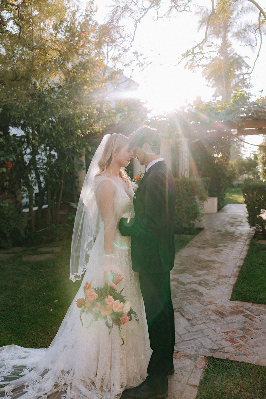 romantic gardenhouse wedding with sheer tulle sleeved wedding dress and mid length bridal dress