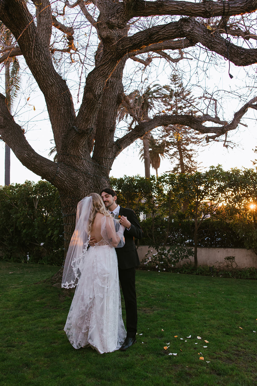 fingertip length vine and leaf lace wedding veil on bride for Southern California ethereal wedding