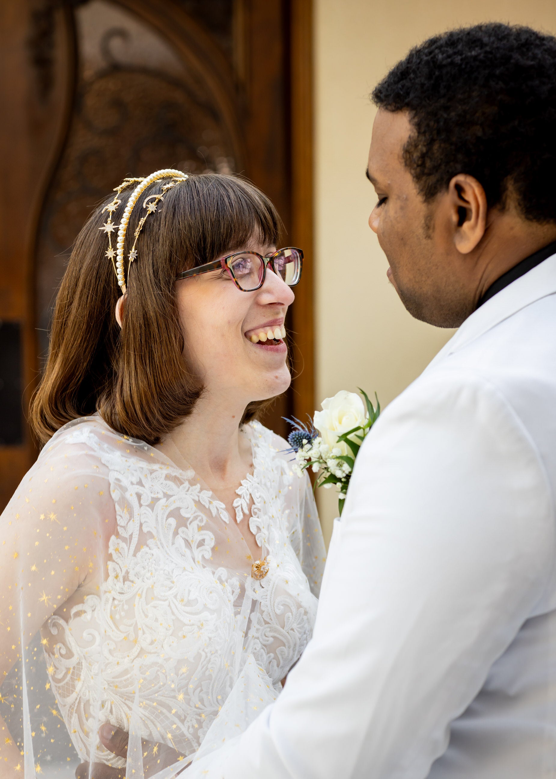 celestial bride wearing V neck shoulder cloak with gold sparkles