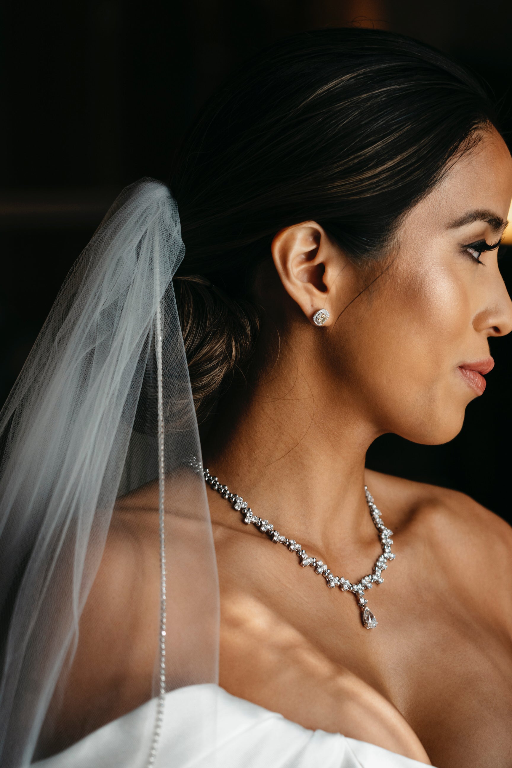 classic beaded rhinestone 1 layer wedding veil over sleek low bun