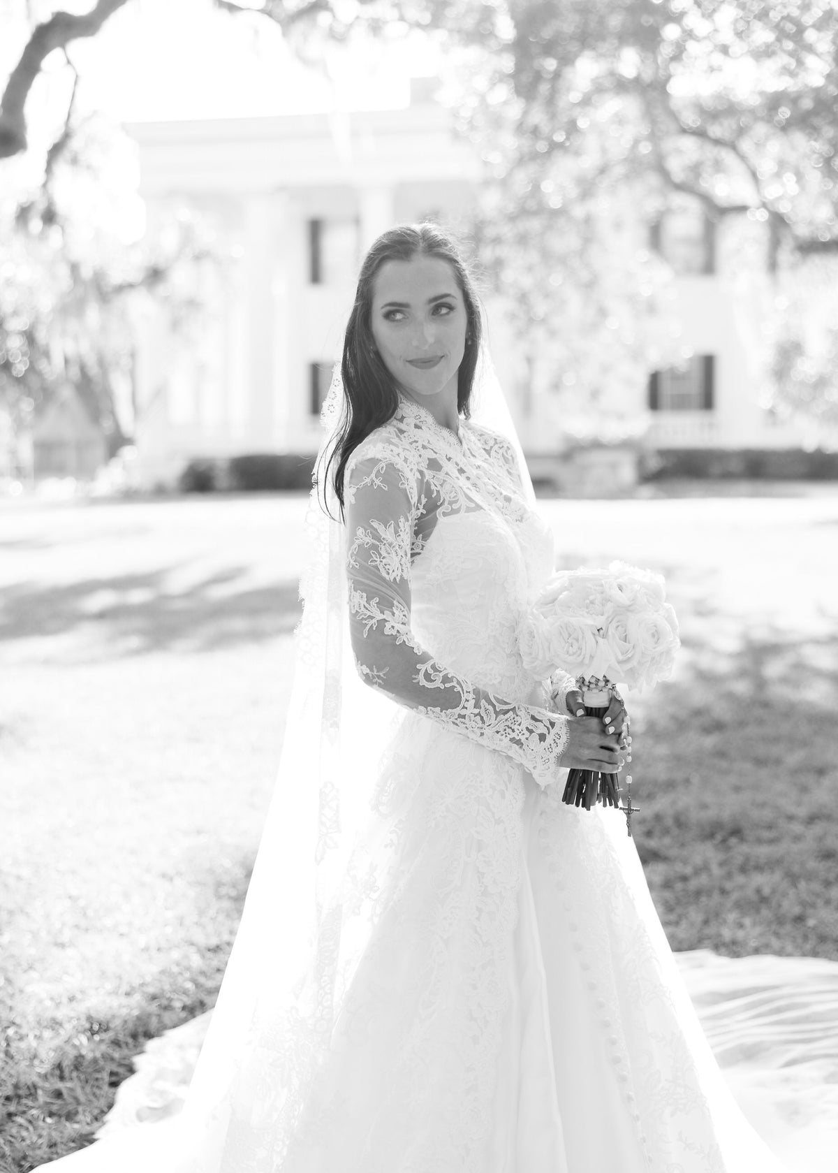 mansion wedding with high neck pearl closure and French lace