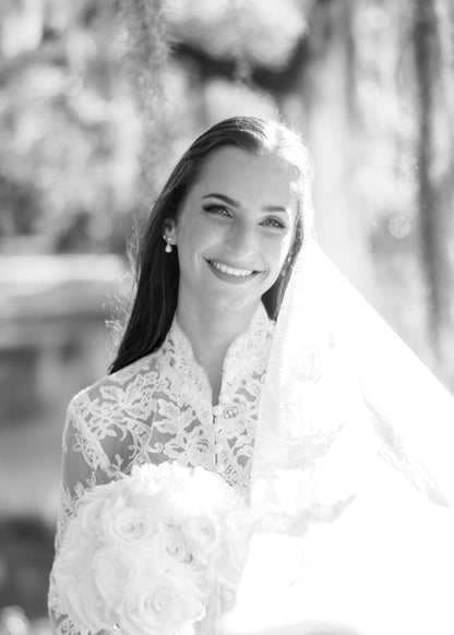 long sleeve high neck  lace bridal cape in ivory with buttons down front and matching lace mantilla bridal veil