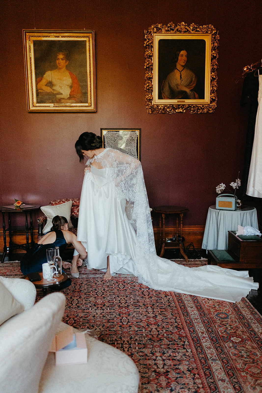 long lace bridal cloak in chantilly lightweight fabric and elegant updo
