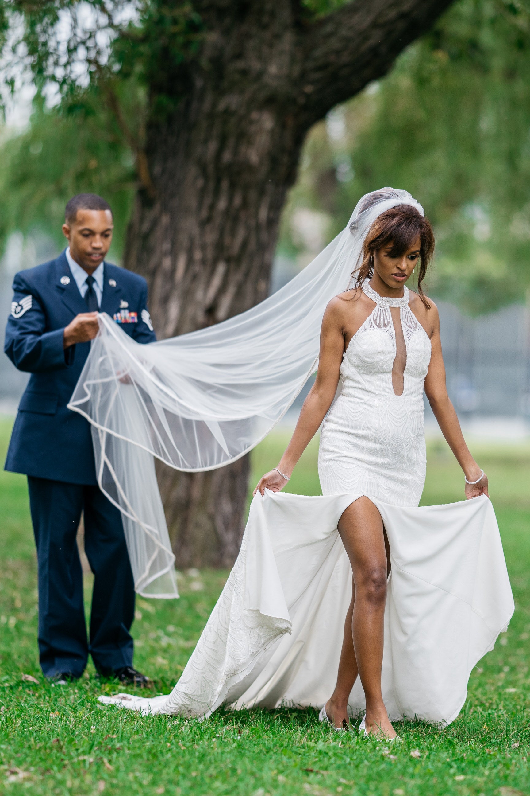 bride in sexy halter dress with long royal length bridal veil cathedral length