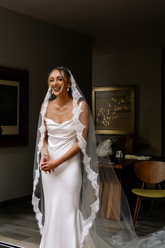 romantic eyelash lace royal length wedding veil in off white for bride in draped bodice wedding dress