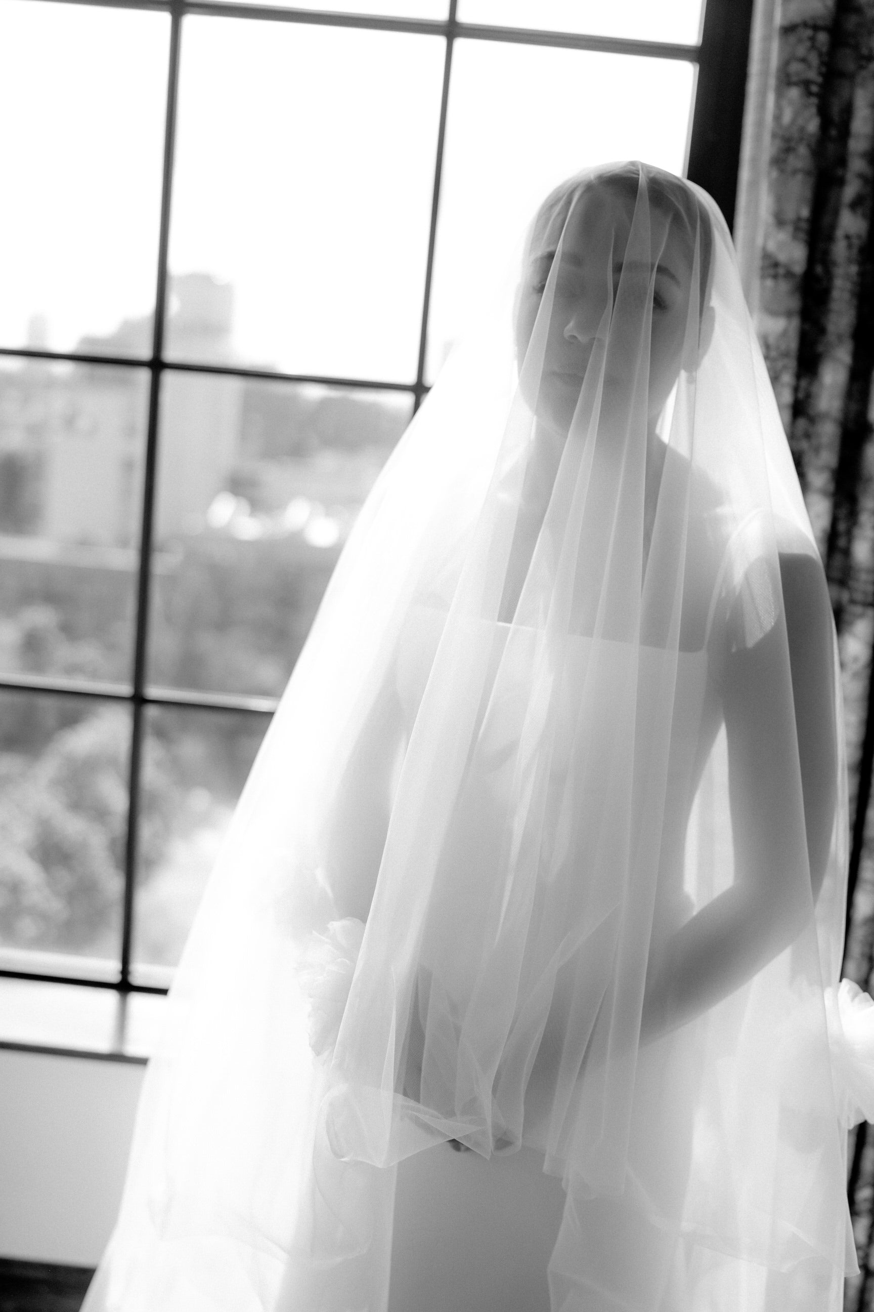 drop silk wedding veil with appliquéd tulle flowers scattered