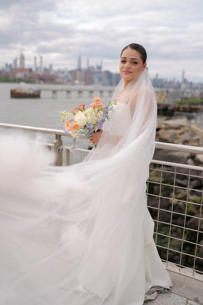 chic city wedding with long drop two layer flower cathedral veil  under sleek clean bun