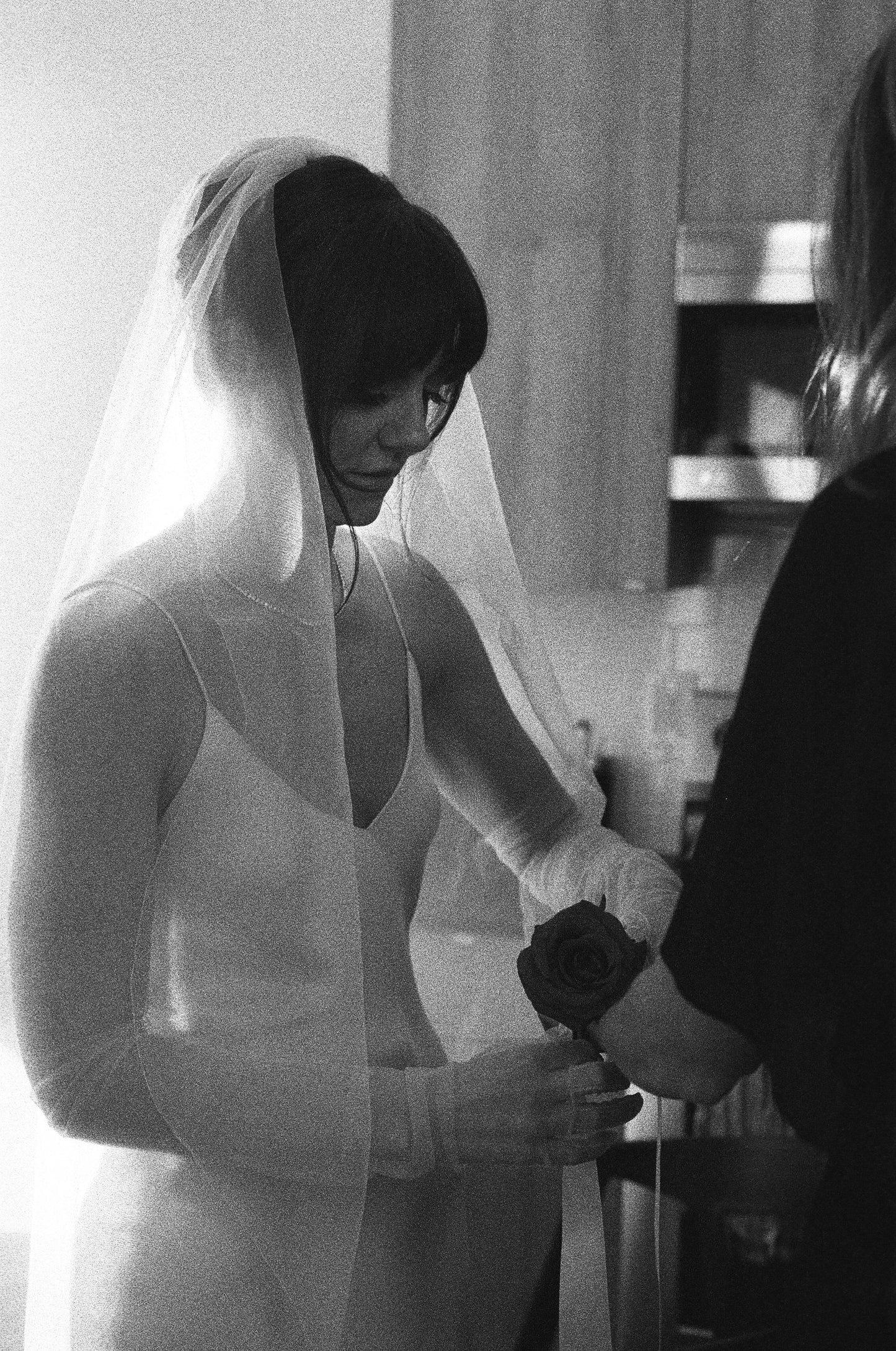 romantic cascade ruffle minimalist silk bridal veil over bride's updo