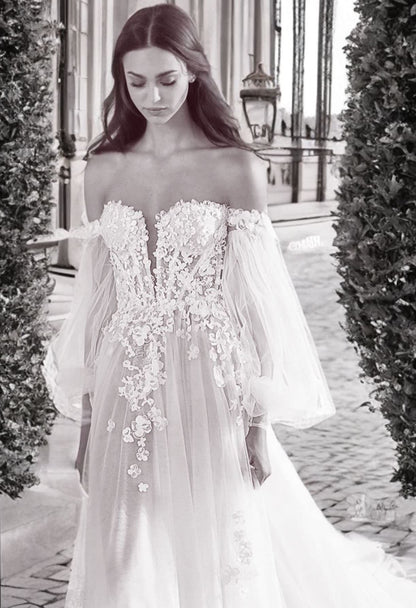 French bride in a DIY off-shoulder puff sleeve set with lace armband
