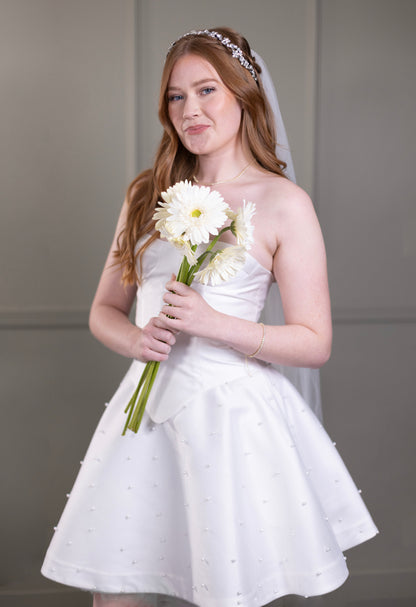 bridal reception look with short dress and rhinestone beaded wedding hairband
