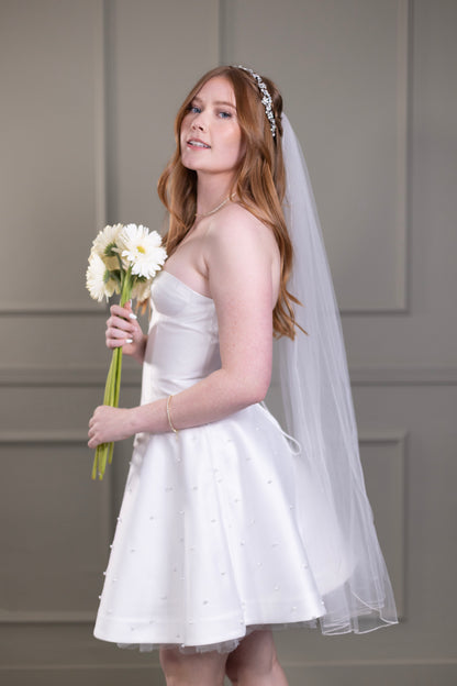 strapless bridal corset and skirt with rhinestone headband with daisies