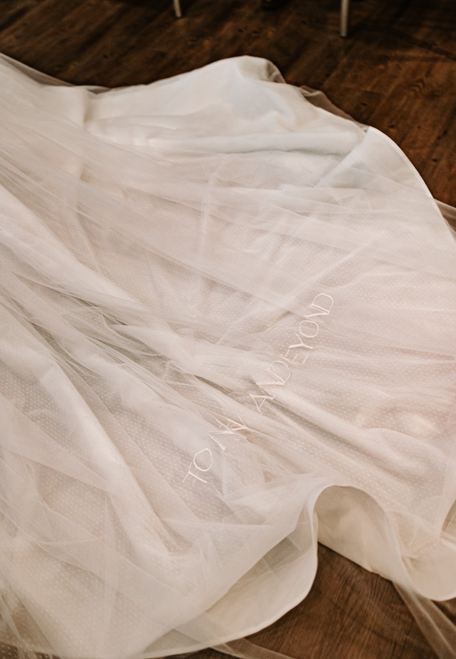 embroidered sans serif wedding veil cathedral length with Disney quote on bottom