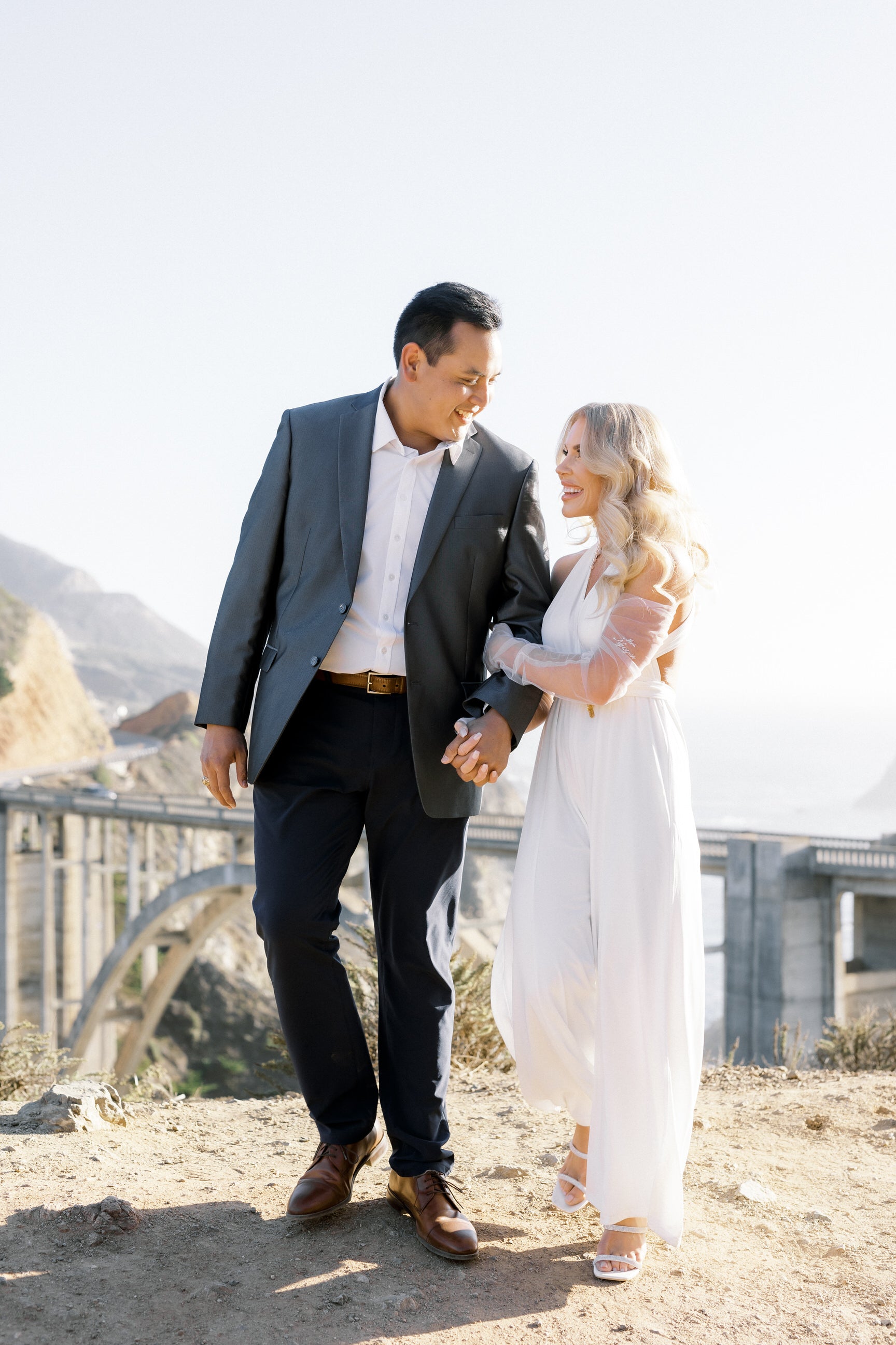 romantic Santa Barbara elopement with bride in jumpsuit and bicep embroidered long glove set