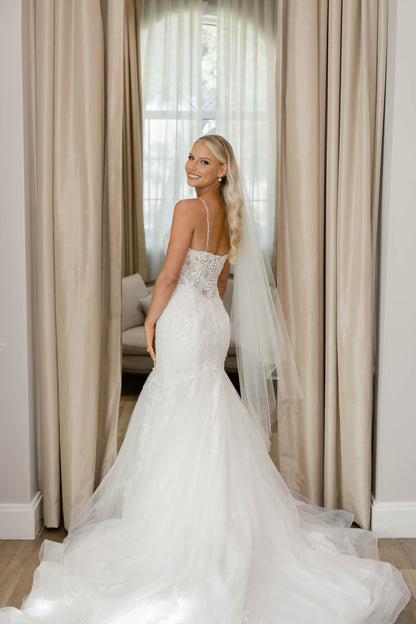 spaghetti strap trumpet bridal dress with knee length bridal veil with simple cut edge in glimmer 