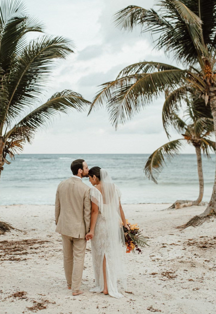 tropical beach wedding with slit lace bridal gown and one layer ankle length wedding veil