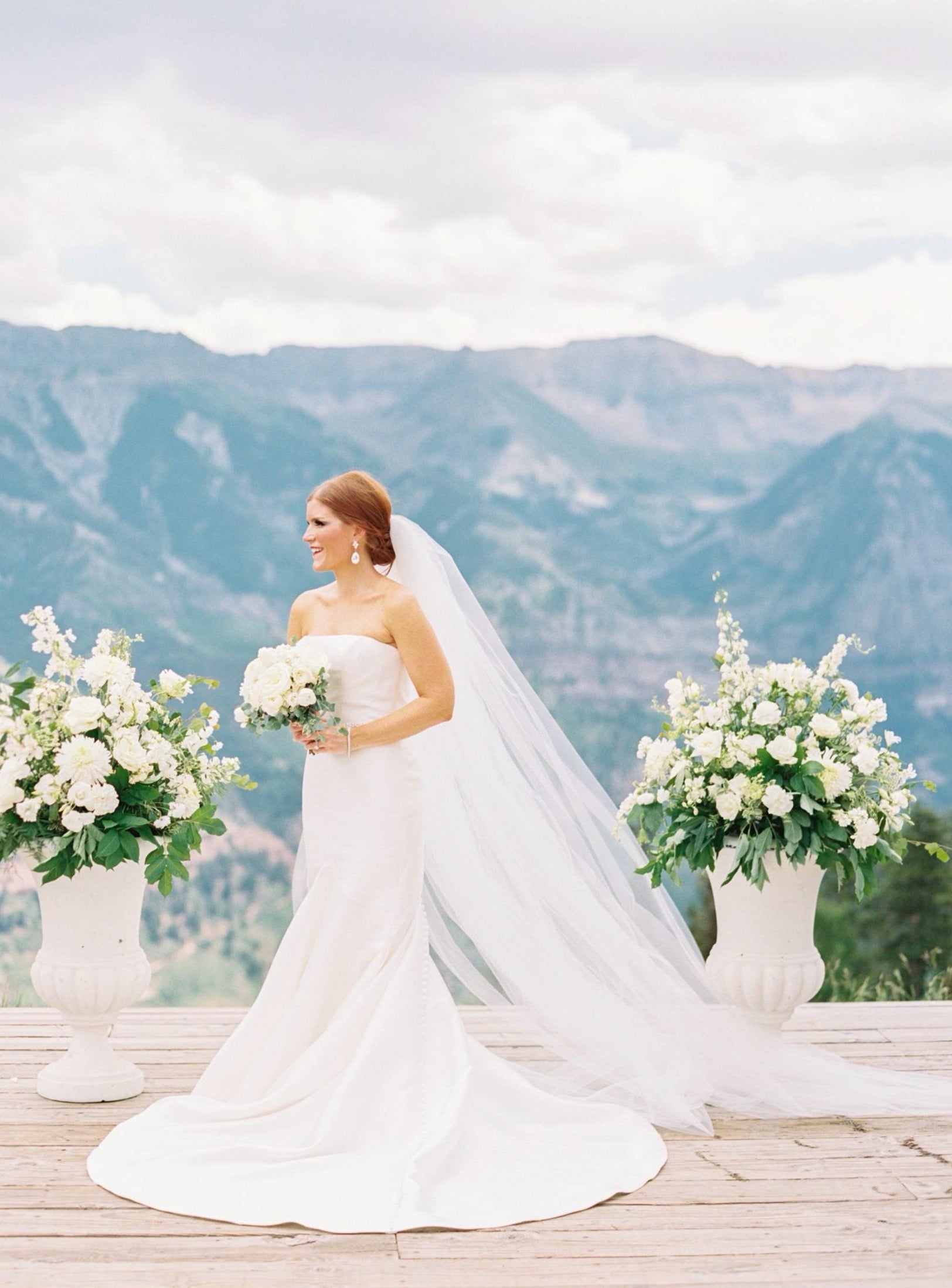 extra puffy full two tier cathedral length wedding veil and simple A line strapless dress