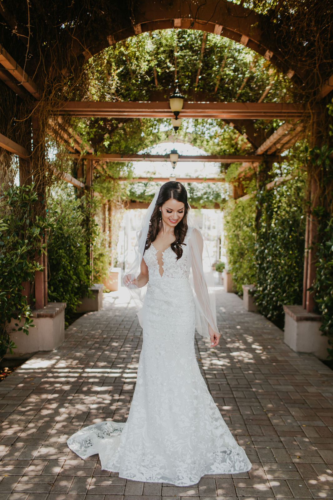 vineyard wedding with sheer one tier fingertip length veil