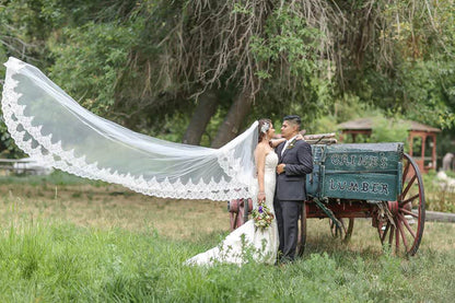 extra long royal length lace trimmed veil for rustic outdoor wedding