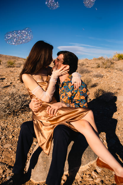 desert engagement photo shoot with sheer long bridal gloves without fingers
