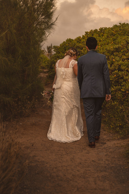 romantic sunset wedding with short lace veil under low updo