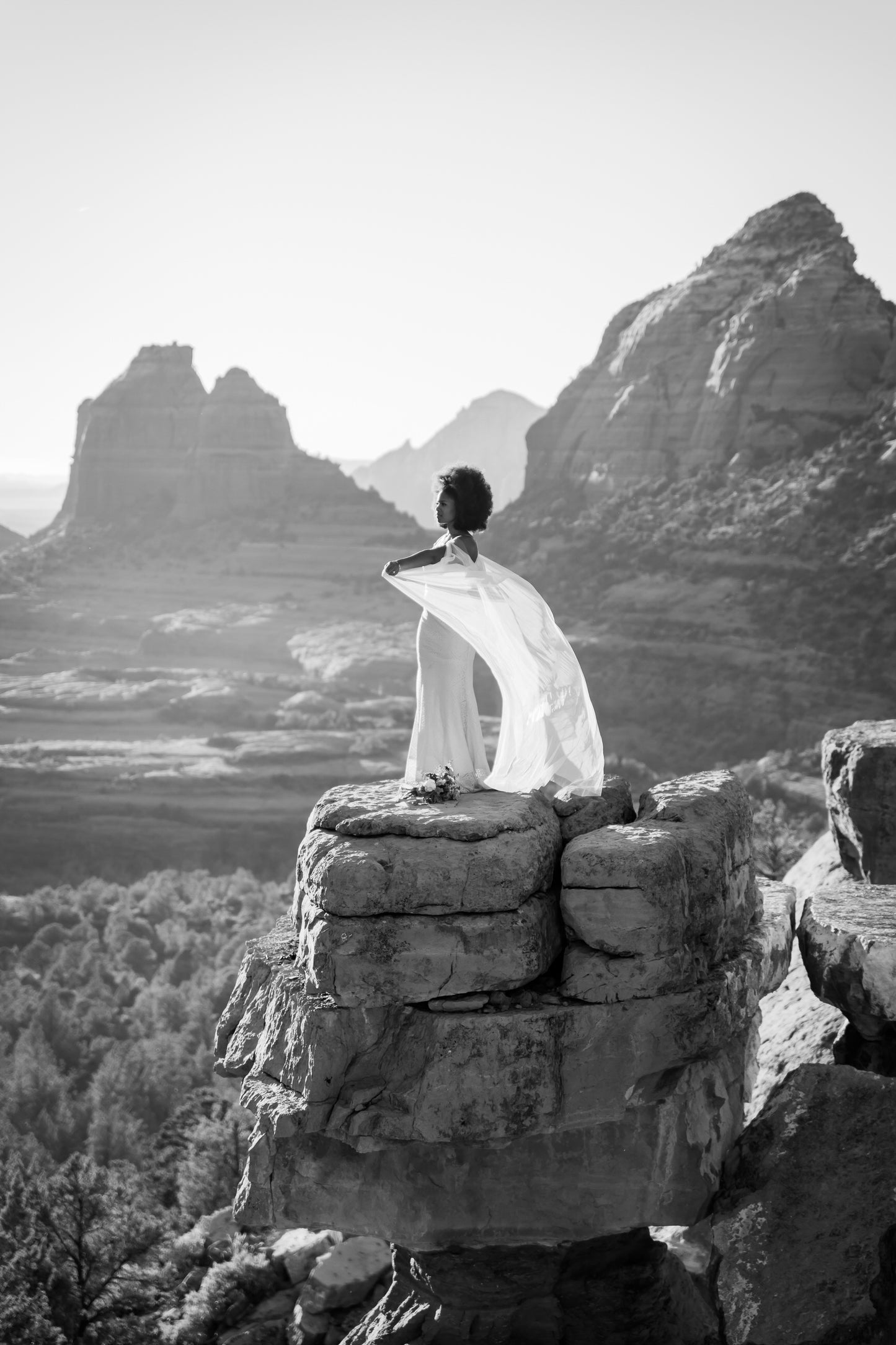 modern bride on cliff with Grecian wedding cape veil 