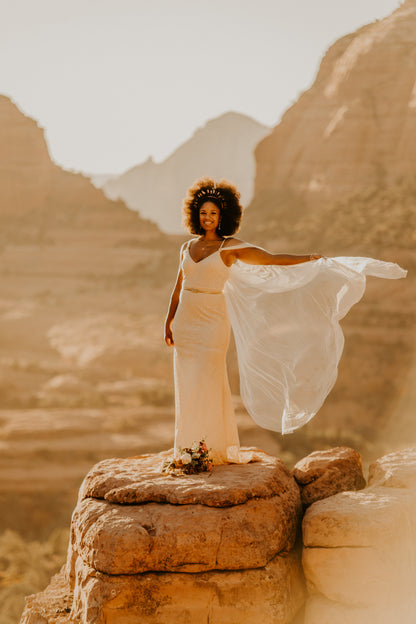desert outdoor wedding with soft ivory long cape 