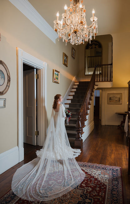 old Hollywood style draped wedding cape on long sleeve dress