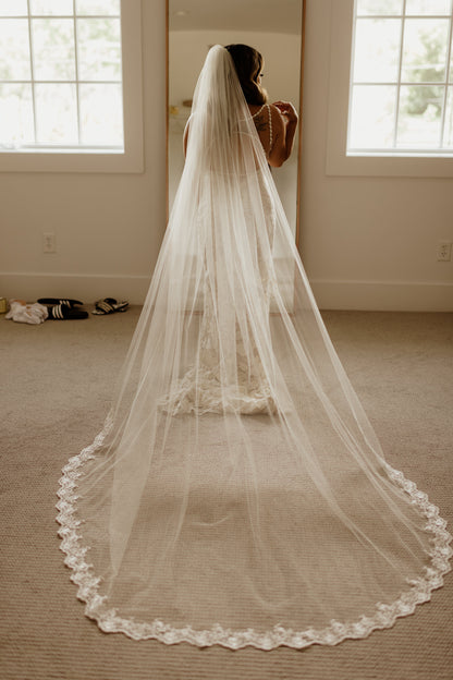 classy long royal length bridal veil with flower French lace trim on bottom for ivory lace bridal sheath gown