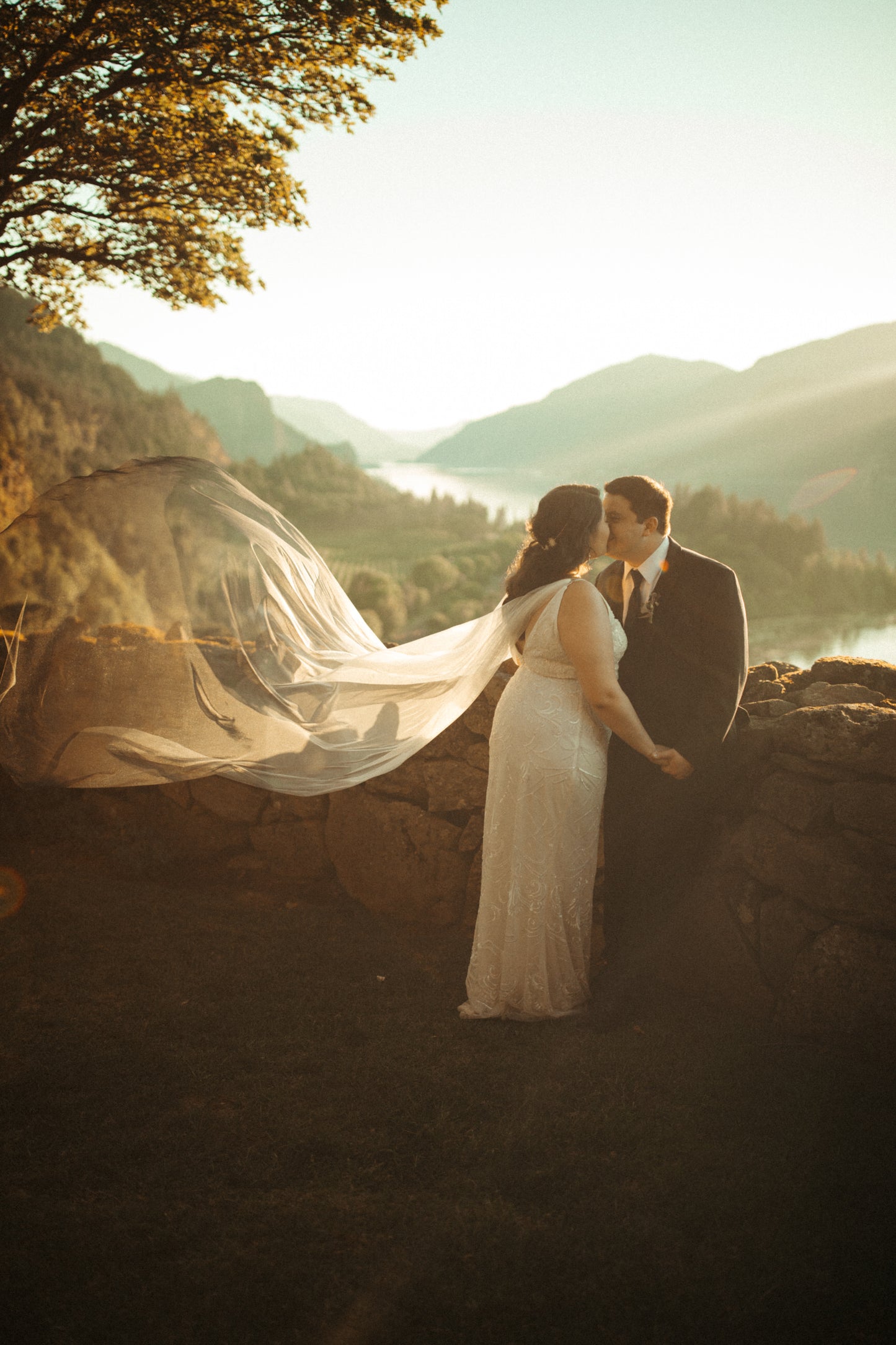 sunset lakeside wedding with romantic blue accessories